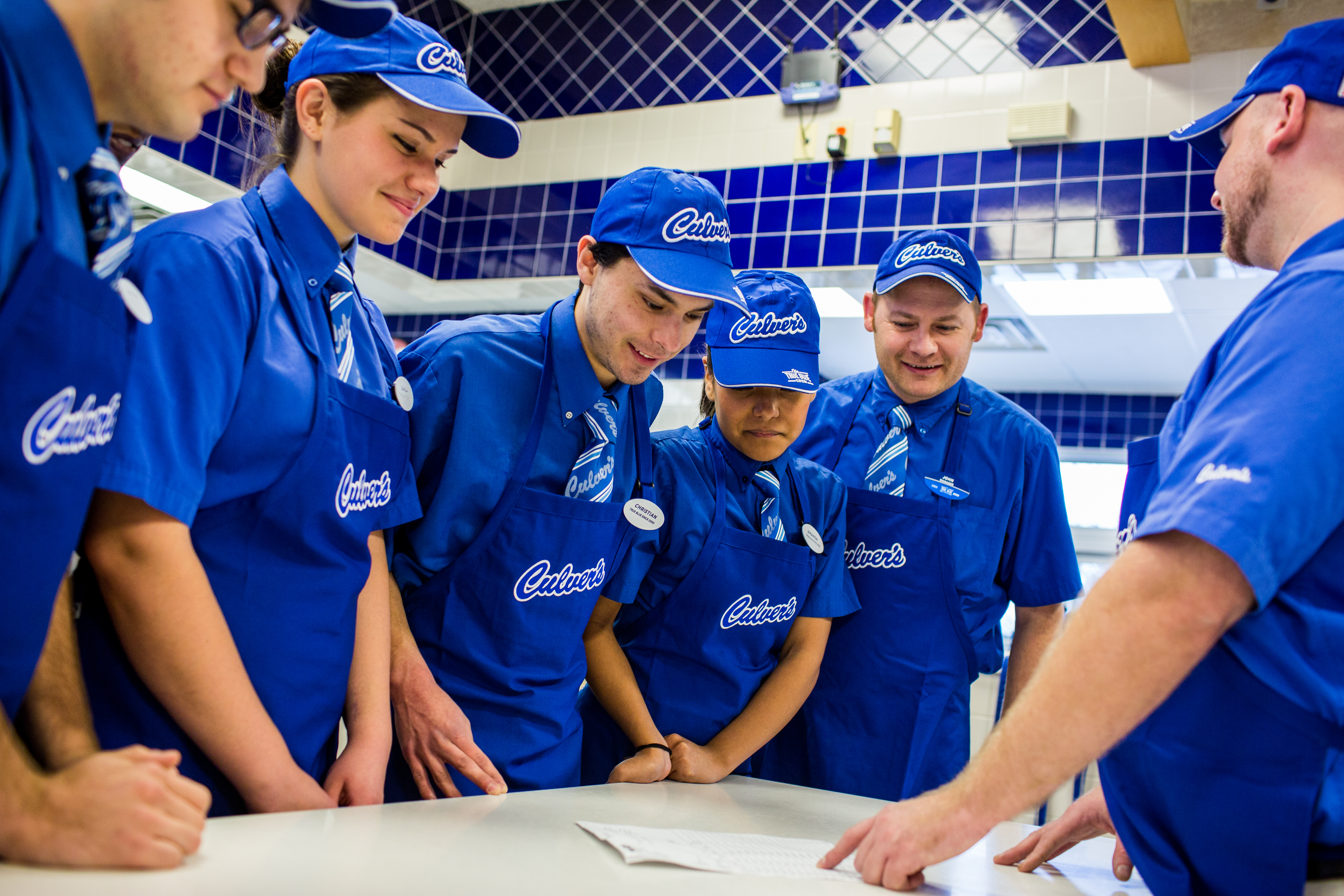 Adams Business Solutions team members working together